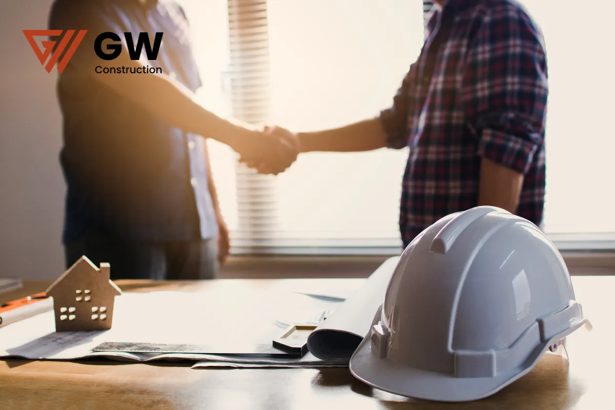 deck-structural-repair-contractor-two-men-handshaking-in-office deck-structural-repair-contractor-two-men-handshaking-in-office