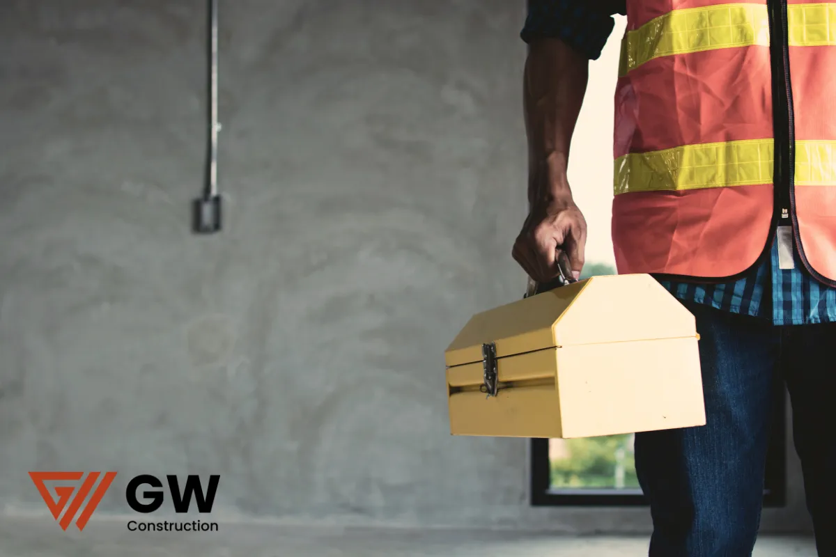 sb-326-full-service-contractor-standing-with-tool-box